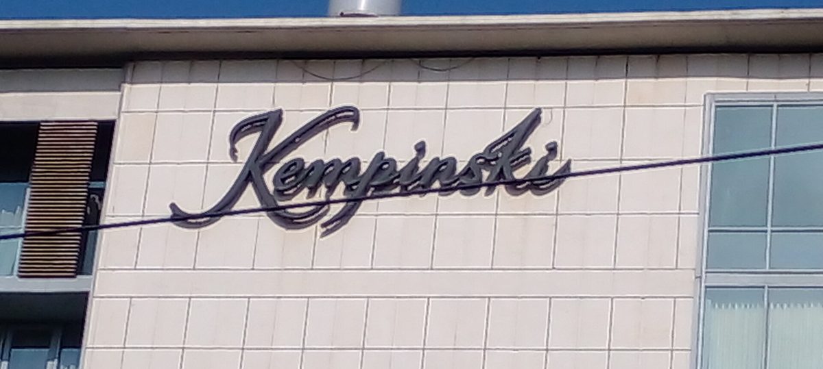 Kempinski signage on the hotel facade in Accra